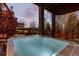 Luxurious outdoor hot tub providing a relaxing retreat within a private backyard setting at 828 Rabbit Run Dr, Golden, CO 80401