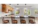 Counter seating at the wet bar overlooks a large window, and provides plenty of space at 828 Rabbit Run Dr, Golden, CO 80401