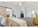 Relaxing main bedroom featuring a barn door and view of ensuite bathroom at 828 Rabbit Run Dr, Golden, CO 80401