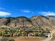 Scenic mountain and hillside neighborhood with fall foliage at 828 Rabbit Run Dr, Golden, CO 80401