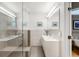 Modern bathroom with glass shower and sleek vanity at 840 S Gaylord St, Denver, CO 80209