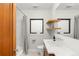 Clean bathroom with shower/tub and shelving at 840 S Gaylord St, Denver, CO 80209