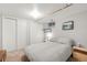 Simple bedroom with neutral carpet, full bed, overhead lighting and double-door closet at 840 S Gaylord St, Denver, CO 80209