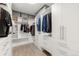 Walk-in closet with custom shelving and drawers at 840 S Gaylord St, Denver, CO 80209