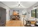 Dining room with hardwood floors and direct access to a modern kitchen at 840 S Gaylord St, Denver, CO 80209