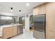 Spacious kitchen featuring stainless steel appliances and an island at 840 S Gaylord St, Denver, CO 80209