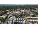 An aerial view of townhouses, trees, and mountains in the distance at 2831 W 25Th Ave # 3, Denver, CO 80211