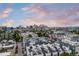 An aerial view shows townhouses and the cityscape of Denver at 2831 W 25Th Ave # 3, Denver, CO 80211