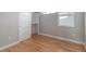 Bright bedroom with hardwood floors, closet and white trim at 2831 W 25Th Ave # 3, Denver, CO 80211