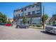 Modern building with parking and well-maintained landscaping at 2831 W 25Th Ave # 3, Denver, CO 80211