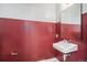 Updated powder room featuring vanity and bold painted wall at 2831 W 25Th Ave # 3, Denver, CO 80211