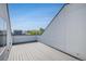 Large rooftop deck with cityscape views and gray composite decking at 2831 W 25Th Ave # 3, Denver, CO 80211