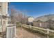 Small backyard with gravel ground cover and a wooden fence at 4460 S Jebel Ln, Centennial, CO 80015
