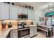 Bright kitchen with stainless steel appliances and granite countertops at 4460 S Jebel Ln, Centennial, CO 80015