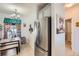 Kitchen with stainless steel refrigerator and breakfast nook at 4460 S Jebel Ln, Centennial, CO 80015