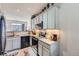 Modern kitchen with stainless steel appliances and granite countertops at 4460 S Jebel Ln, Centennial, CO 80015