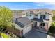 Beautiful two-story home with a well-manicured lawn and attached two-car garage at 20592 E Lake Ave, Centennial, CO 80016