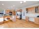 Spacious kitchen featuring light wood cabinetry, stainless steel appliances, and ample counter space at 20592 E Lake Ave, Centennial, CO 80016