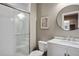 Modern bathroom with a glass-enclosed shower, white subway tile, and a stylish vanity at 15314 W Baker Ave, Lakewood, CO 80228