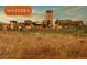Beautiful community with Tuscan-style architecture and landscaping at 15314 W Baker Ave, Lakewood, CO 80228