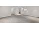 Spacious finished basement area with plush carpeting, perfect for entertaining at 3194 S Milwaukee St, Denver, CO 80210