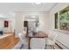 Dining room features modern decor, natural light, and open access to living spaces at 3194 S Milwaukee St, Denver, CO 80210