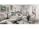 Cozy living room featuring modern furniture and views into kitchen area at 3194 S Milwaukee St, Denver, CO 80210