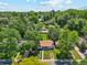Beautiful aerial perspective of the house nestled in a leafy neighborhood at 4140 S Inca St, Englewood, CO 80110