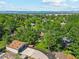 Picturesque aerial shot showcasing the home, garage, and lush surroundings at 4140 S Inca St, Englewood, CO 80110