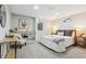 Cozy bedroom featuring neutral tones, plush carpeting, and stylish decor at 4140 S Inca St, Englewood, CO 80110