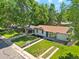 Charming single story home with a well-manicured lawn and mature shade trees at 4140 S Inca St, Englewood, CO 80110