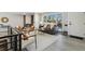 Bright living room boasts large windows, modern fireplace, and comfortable seating area at 4140 S Inca St, Englewood, CO 80110