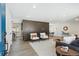 Bright living room with modern furnishings and a view of the dining area at 4140 S Inca St, Englewood, CO 80110