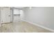 Versatile room with light wood floors and a large window, perfect for a home office or studio at 4140 S Inca St, Englewood, CO 80110