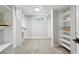 Spacious walk-in closet with custom shelving and ample storage space at 4140 S Inca St, Englewood, CO 80110