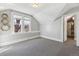 Bright bedroom with a large window, neutral decor, and ample natural light at 1626 Albion St, Denver, CO 80220