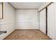 Bedroom features wood trim and neutral carpet at 7815 Conifer Rd, Denver, CO 80221