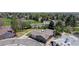 Lovely aerial view of home showcasing its well-manicured lawn and a picturesque setting by the lake at 39 S Scott Dr, Broomfield, CO 80020