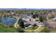 Scenic aerial view overlooking the houses near the lake showcasing a peaceful neighborhood at 39 S Scott Dr, Broomfield, CO 80020