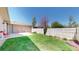A spacious backyard with a lush lawn, patio, and privacy fence at 39 S Scott Dr, Broomfield, CO 80020