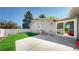 A fenced backyard including a patio and manicured lawn at 39 S Scott Dr, Broomfield, CO 80020