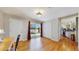 Bedroom with hardwood floors, closet, desk area, and sliding doors to patio at 39 S Scott Dr, Broomfield, CO 80020