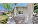 Exterior view of the home with stone accents and mature shade trees at 39 S Scott Dr, Broomfield, CO 80020