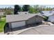 Exterior view of the home showing the attached two-car garage and well-maintained landscaping at 39 S Scott Dr, Broomfield, CO 80020