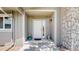 Inviting front entrance with a white door and stone accents at 39 S Scott Dr, Broomfield, CO 80020