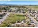 A view of a neighborhood park featuring a playground, picnic area, and green space for community enjoyment at 437 Buckskin Rd, Berthoud, CO 80513