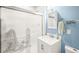 Bathroom with white vanity, a shower, and attractive fixtures at 437 Buckskin Rd, Berthoud, CO 80513