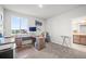 Bedroom with wooden desk, large window, and views at 437 Buckskin Rd, Berthoud, CO 80513