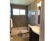 Modern bathroom with a shower-tub combo, stylish vanity, and contemporary fixtures at 6147 Dunraven, Golden, CO 80403