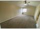 Bedroom with carpeted floor and ceiling fan at 10067 Idalia St, Commerce City, CO 80022